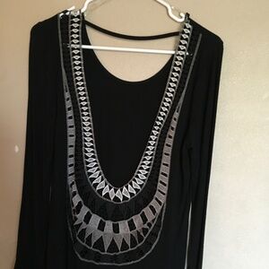 Long Black Blouse w Beige trim. Very low cut in front. Probably need a cami.